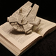 Illustration for article titled Storybook characters burst from their pages in these incredible paper sculptures